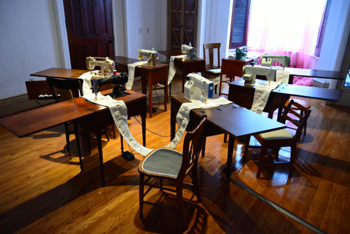 Melissa Ann Vandenberg, Machine Mandala. Sewing machines, linen, thread, chairs, 2014.