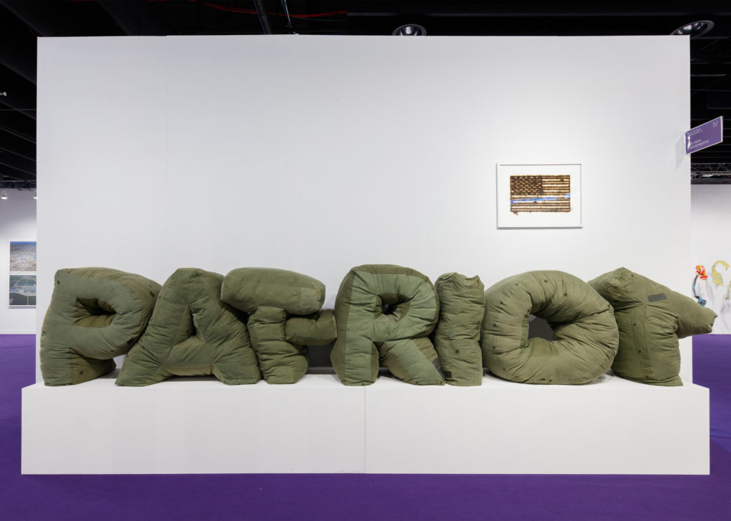 Melissa Ann Vandenberg, Pat•Riot. Military surplus fabric (shelters) & polyester, 490x92x92 centimeters, 2017. Photo David Willems, Volta Art Fair, NYC 2017