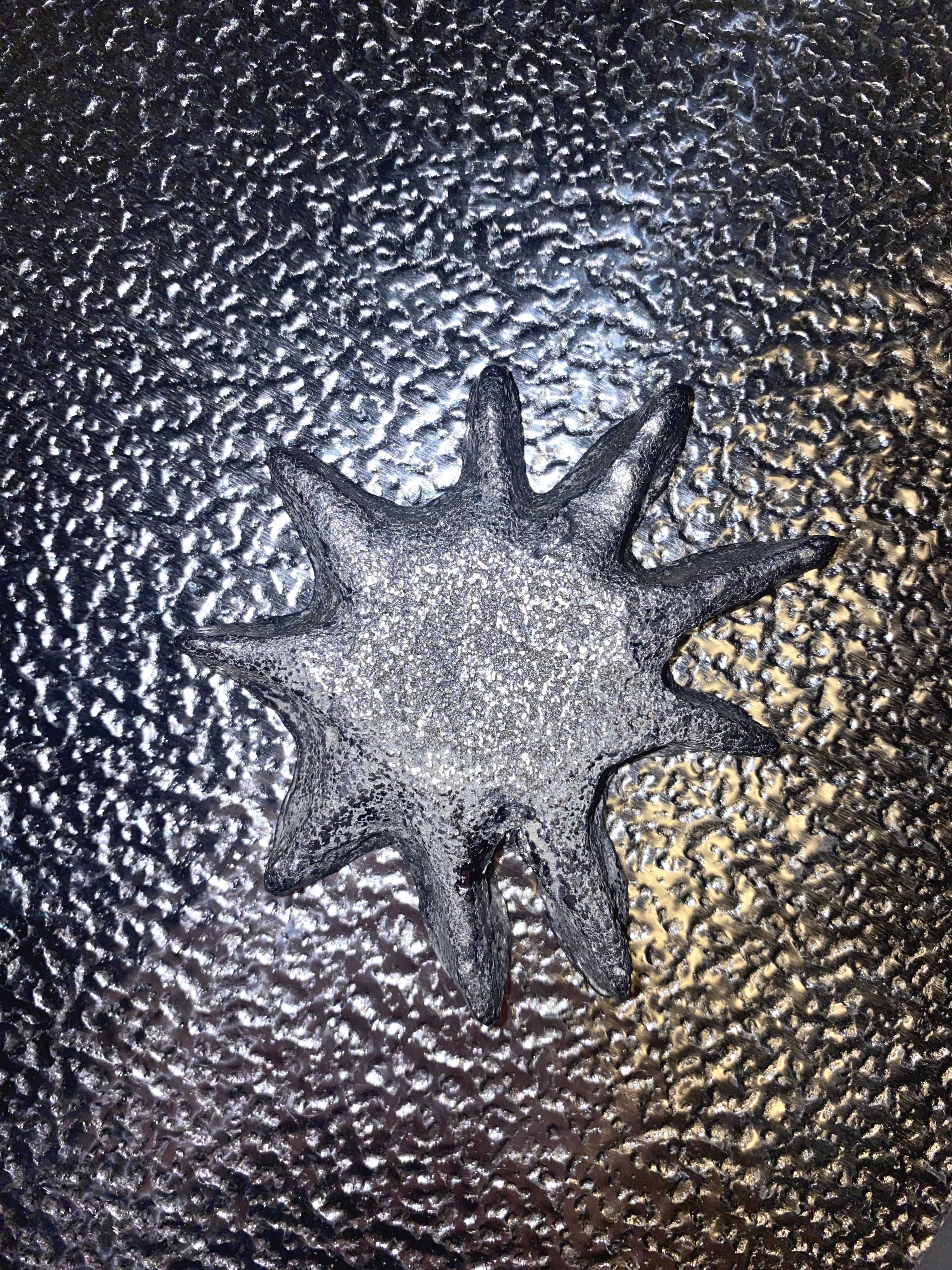 Maria Pita Guerreiro, SUN, Material: hammered sheet metal, tin, 2025